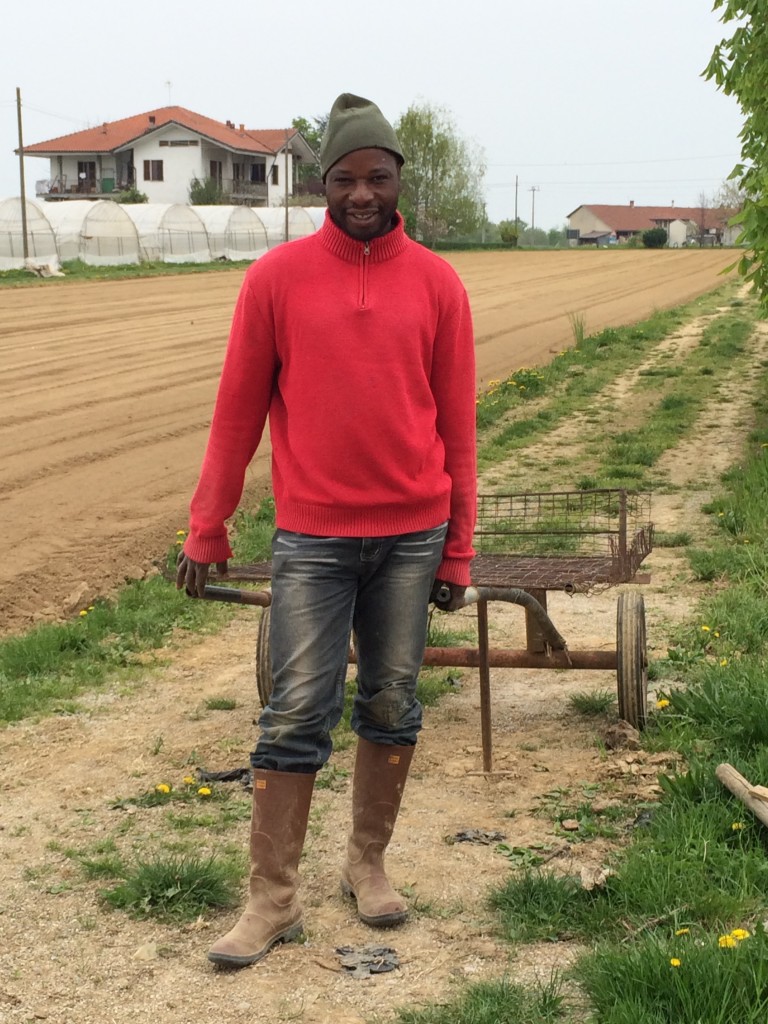 One of Andrea's workers,  upright after the backbreaking work of seed planting