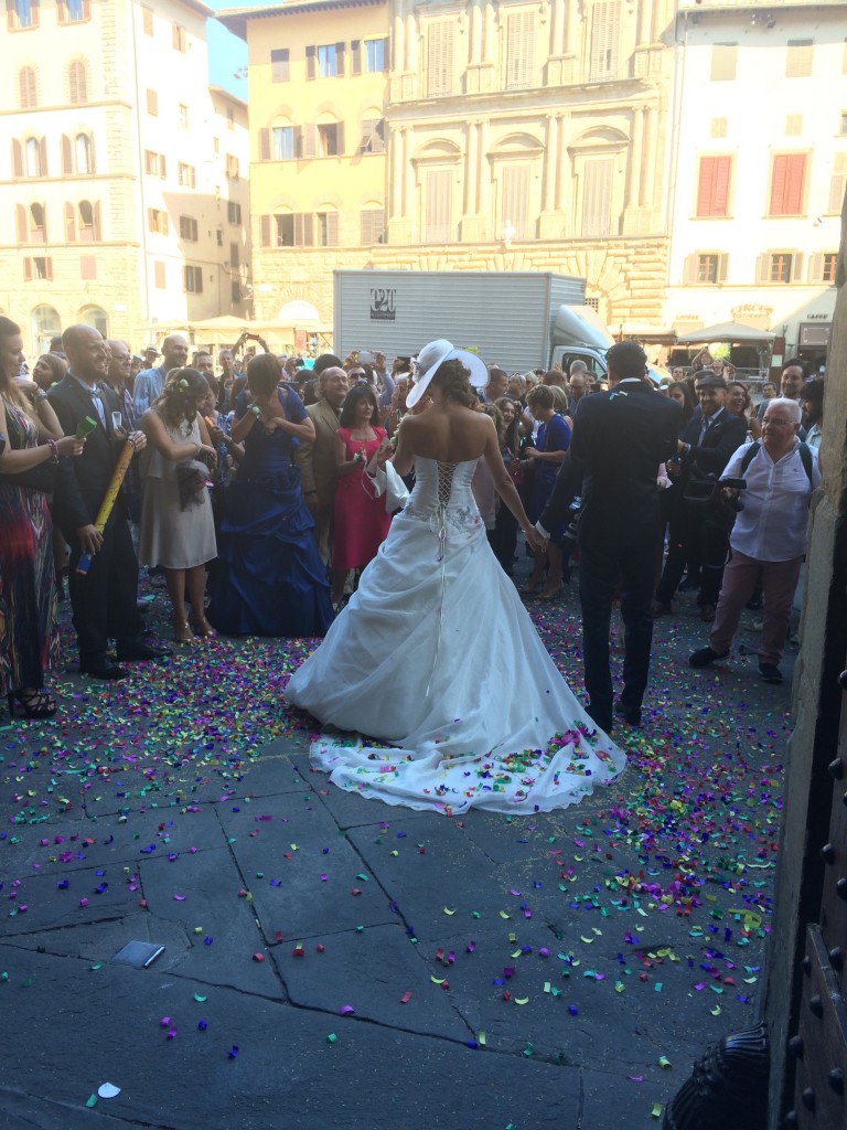 Late summer wedding in Florence outside Palazzo Vecchio