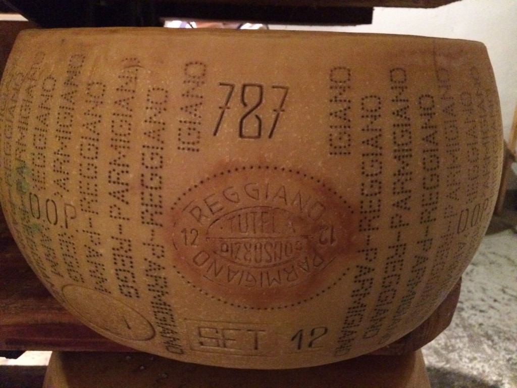 Parmigiano Reggiano stamped with producer's number and month and year of production