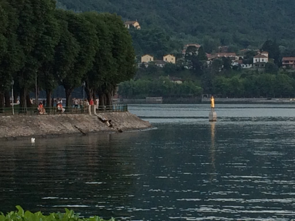 The gold statue of San Nicolo on Lake Como, patron saint of Lecco